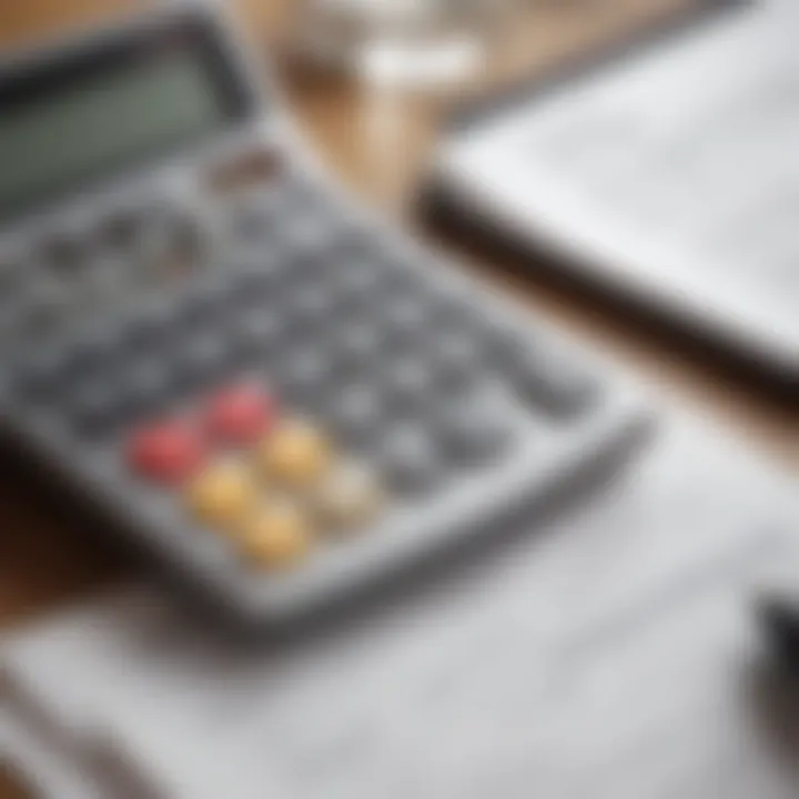 A calculator and financial documents on a table