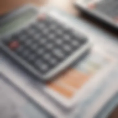 A close-up of a calculator resting next to a stack of financial documents